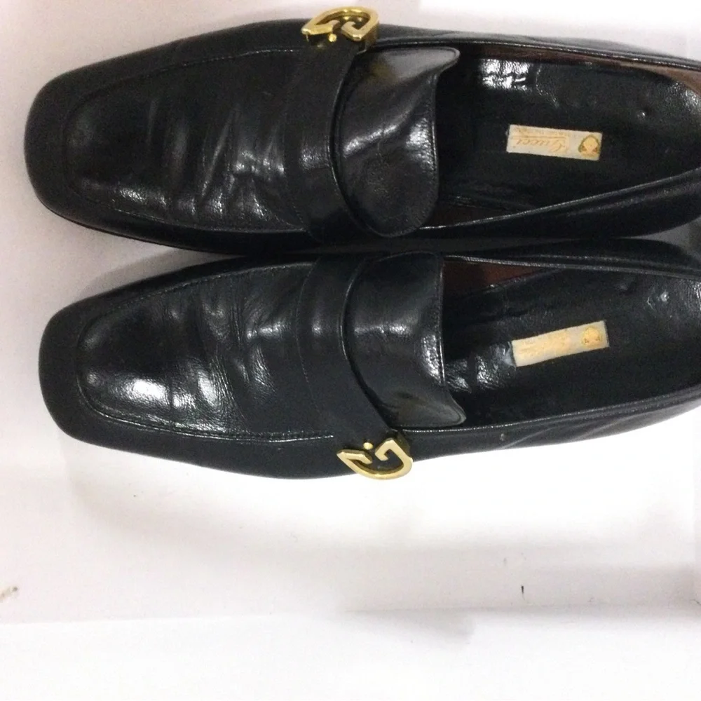 Classic Black Leather Slip-On Loafers with Gold Hardware